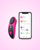 Ferri by Lovense panty app controlled vibrator next to a smartphone displaying an app interface on a pink background.