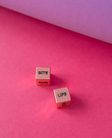 Rose gold metallic kinky dice game