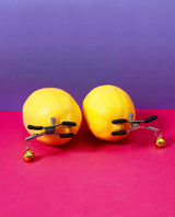 Bell Nipple Clamps on a lemon