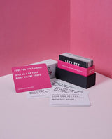 Box of Letz Get Naughty Cards, pink dare card, white truth cards