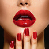 woman's red lips and nails
