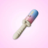 Lovense Spinel Portable App-Controlled Heating Sex Machine pointing downwards on pink background