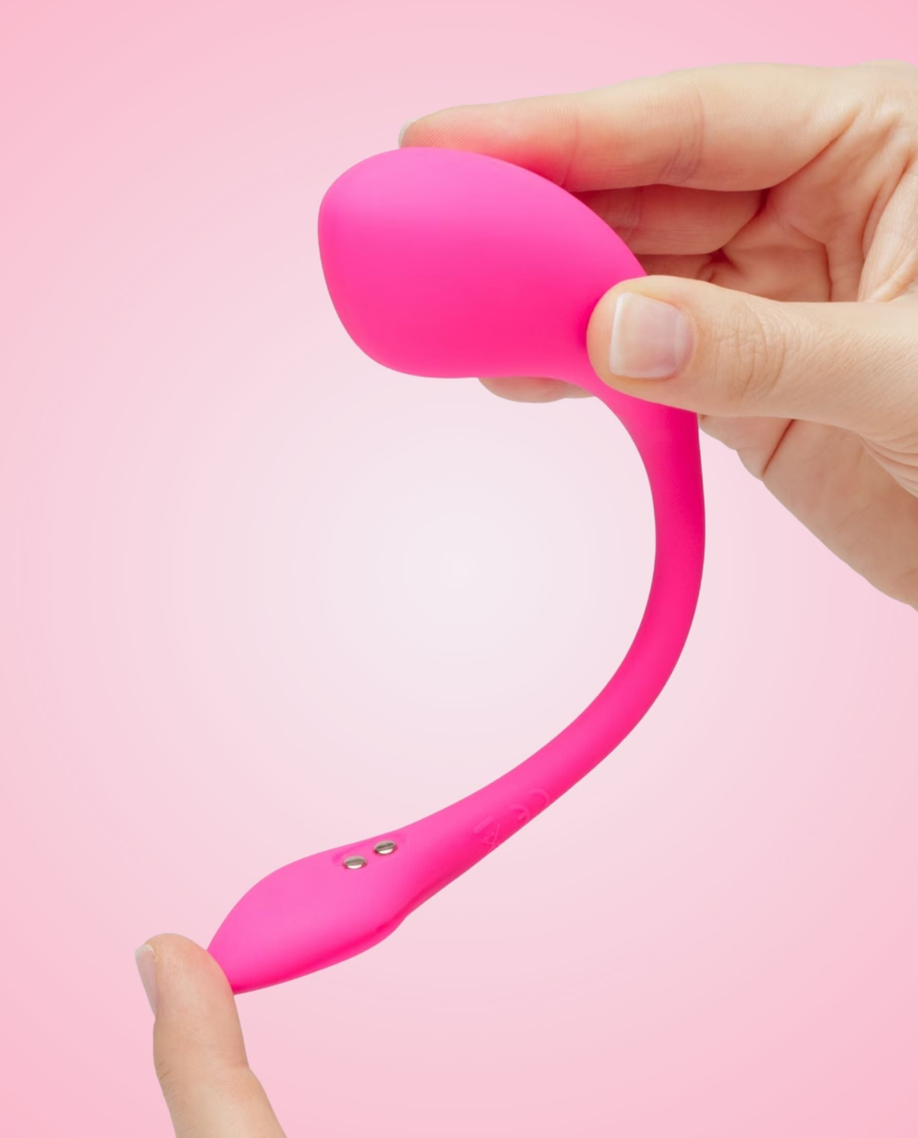 Lush 4 held by a hand to show how flexible it's body safe silicone material really is.