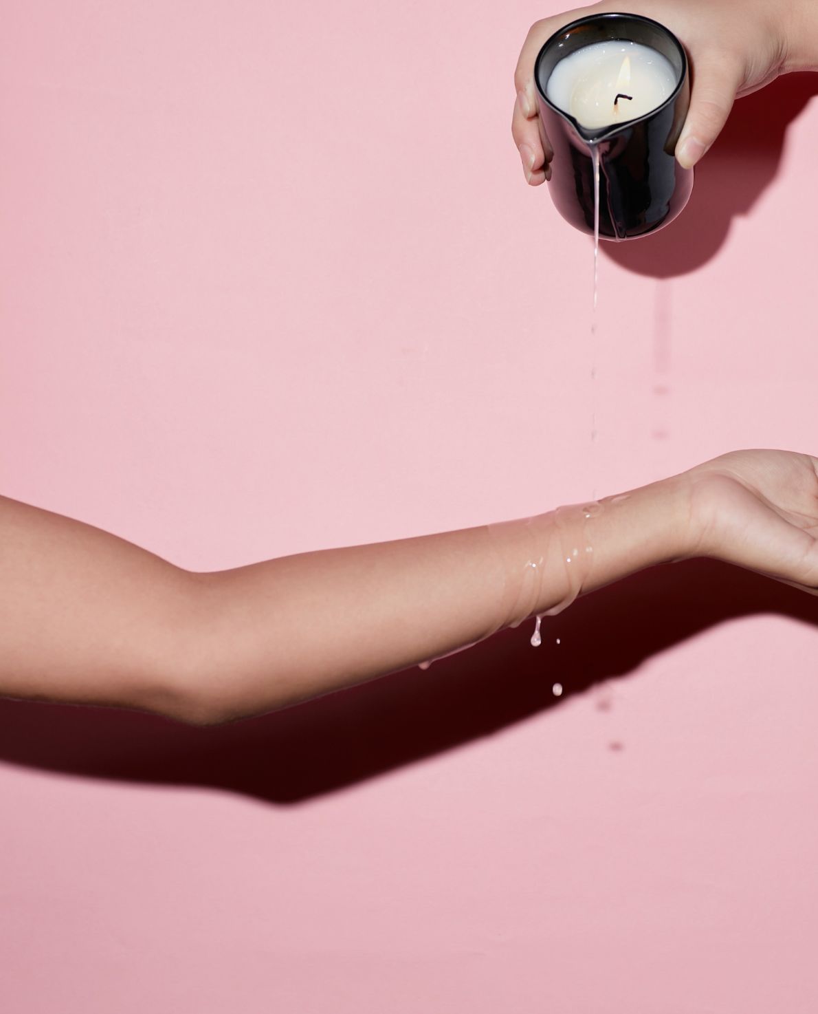 massage oil candle dripping onto arm