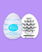 Tenga Egg Wavy packaging on a purple background