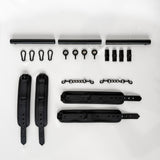 black spreader bar with leather cuffs and connectors flatlay