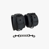 noir wrist cuffs with chain