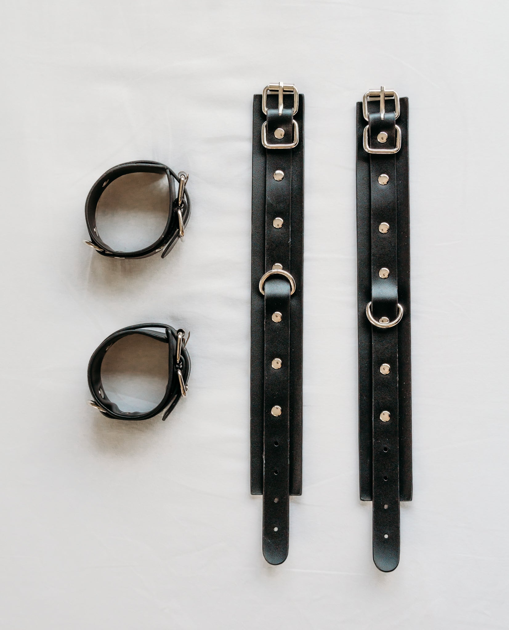 Spreader bar high quality faux leather cuffs
