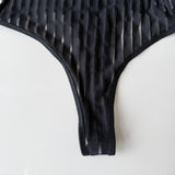 Close up of Tara black bodysuit non-crotchless