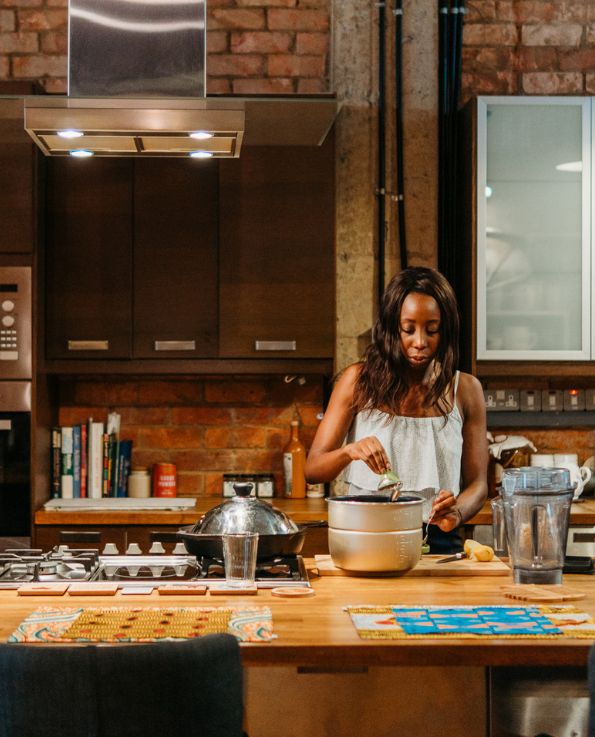 woman preparing food in kitchen