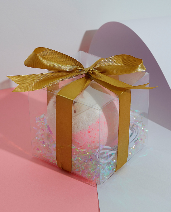 The Sex Bomb, pink and white bath bomb in transparent gift box with gold ribbon