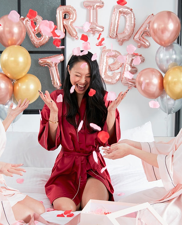balloons, confetti, bachelorette party, red satin gown