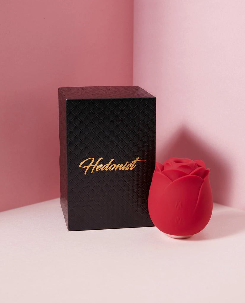 Hedonist Rosette red rose clit sucker sex toy with black packaging box and Hedonist brand name