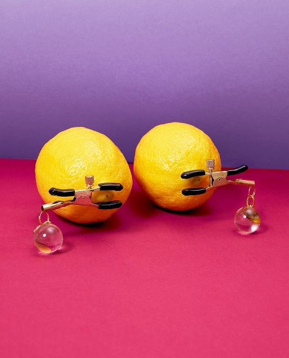 Pearl nipple clamp on lemons
