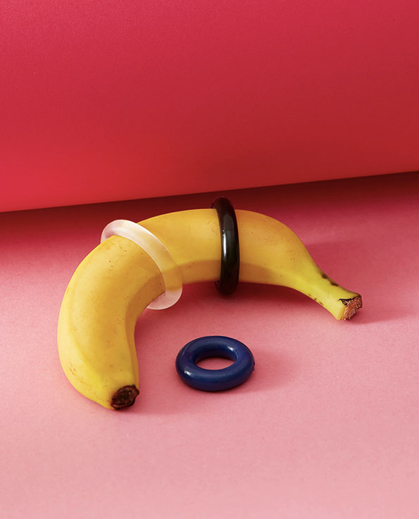 blue transparent and black jelly stretchable cock rings on a banana
